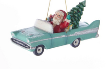 Vánoce - ozdoba santa v autě